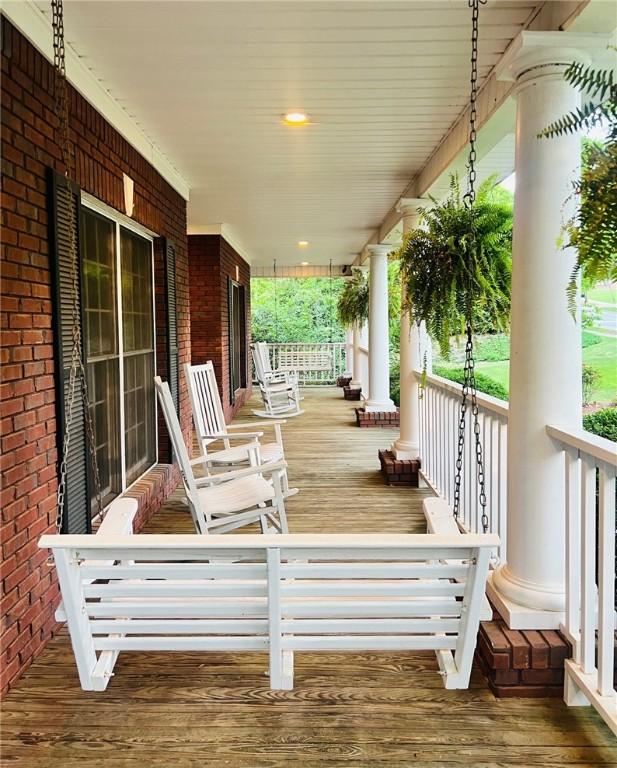 wooden terrace with covered porch