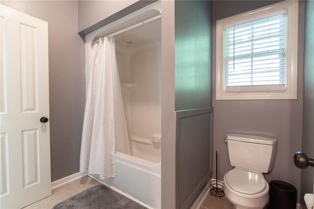 1849 Stoneridge Dr, Auburn, AL 36830 - bathroom with tile patterned flooring, toilet, shower / bathtub combination with curtain, and baseboards