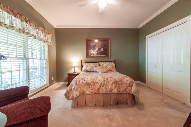 1849 Stoneridge Dr, Auburn, AL 36830 - bedroom with light colored carpet, a closet, crown molding, baseboards, and ceiling fan