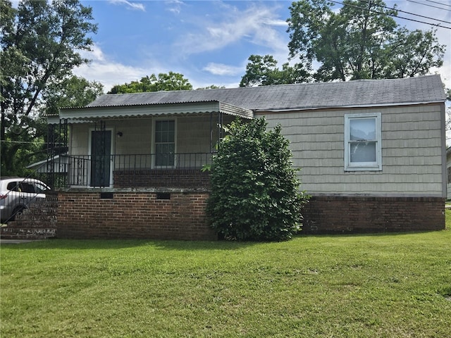 6507 22nd Ave, Valley, AL 36854 - view of home's exterior with a yard and a shingled roof