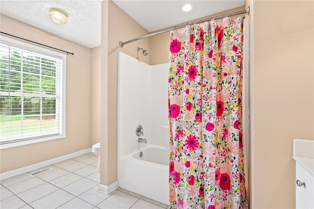 1477 N Donahue Dr Unit 2701, Auburn, AL 36832 - bathroom with tile patterned floors, shower / bath combo with shower curtain, and vanity