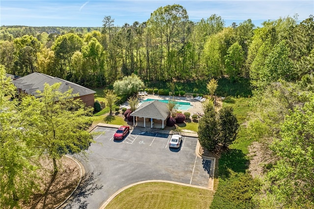 1477 N Donahue Dr Unit 2701, Auburn, AL 36832 - drone / aerial view of a heavily wooded area and a pool