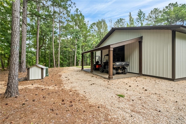 exterior space featuring a storage unit