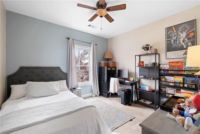 carpeted bedroom featuring ceiling fan