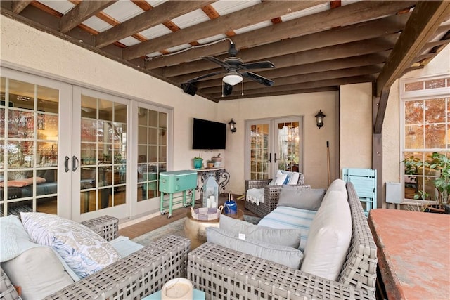 view of patio / terrace with outdoor lounge area, ceiling fan, and french doors