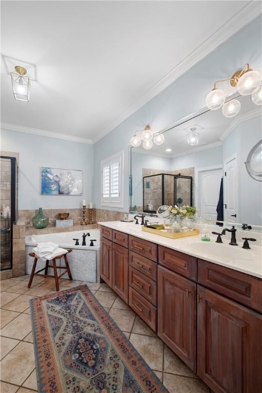 bathroom featuring tile patterned floors, vanity, crown molding, and independent shower and bath