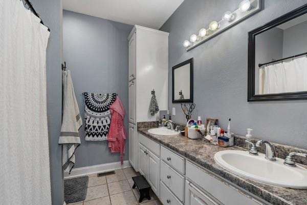 bathroom featuring vanity and tile patterned floors