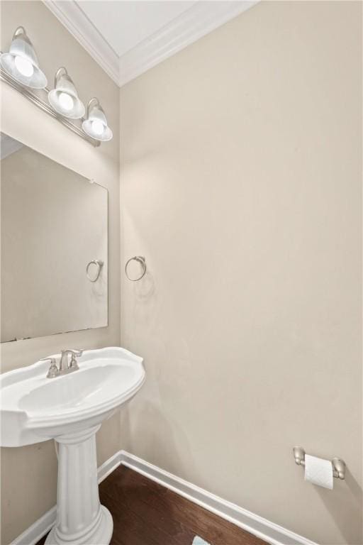 2133 W Farmville Rd W, Auburn, AL 36879 - bathroom with baseboards, wood finished floors, and crown molding