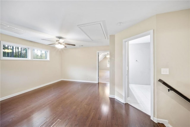 2133 W Farmville Rd W, Auburn, AL 36879 - spare room with attic access, ceiling fan, wood finished floors, and baseboards