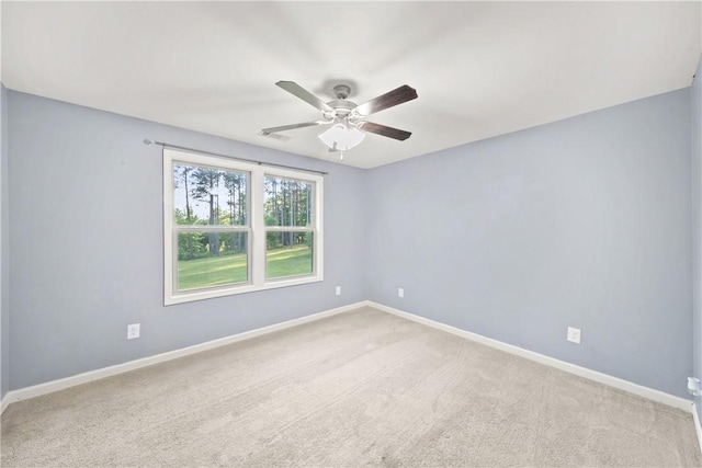 2133 W Farmville Rd W, Auburn, AL 36879 - spare room with a ceiling fan, light colored carpet, and baseboards