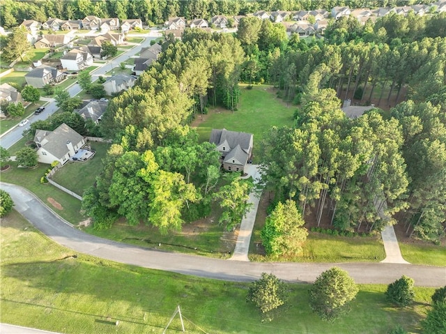 2133 W Farmville Rd W, Auburn, AL 36879 - aerial view of property and surrounding area with nearby suburban area and a tree filled landscape