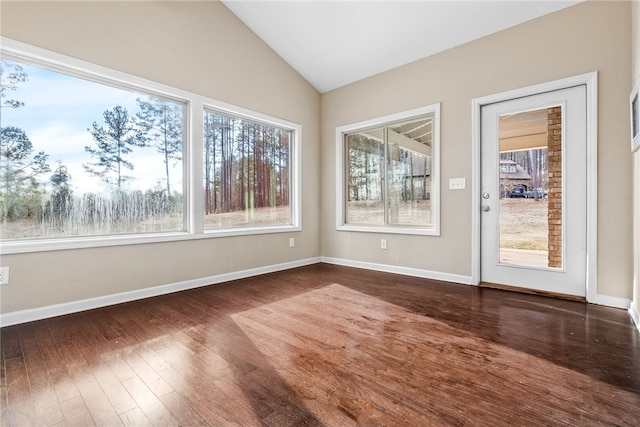 interior space with a healthy amount of sunlight and vaulted ceiling