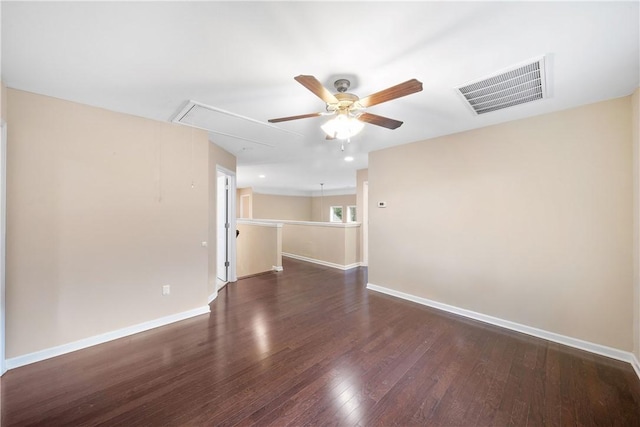 2133 W Farmville Rd W, Auburn, AL 36879 - empty room featuring attic access, ceiling fan, baseboards, and wood finished floors