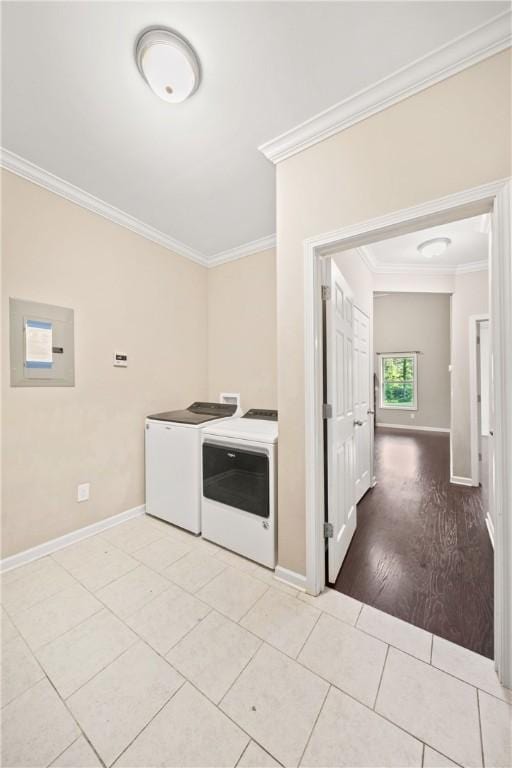 2133 W Farmville Rd W, Auburn, AL 36879 - laundry room featuring washer and dryer, ornamental molding, baseboards, and light tile patterned floors