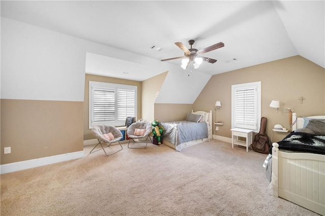 carpeted bedroom featuring ceiling fan and lofted ceiling