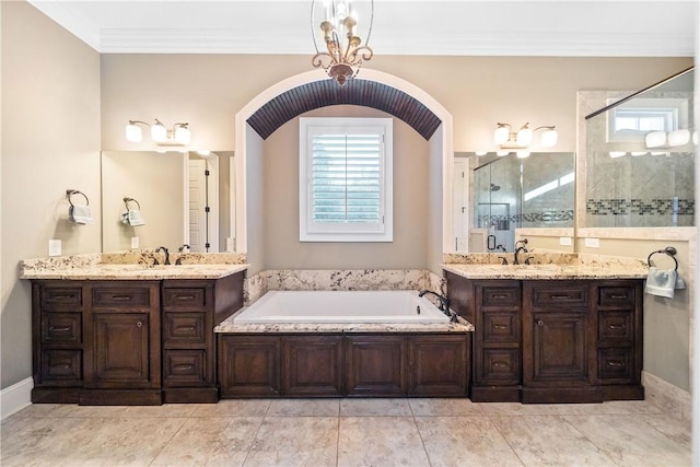 bathroom featuring crown molding, vanity, and independent shower and bath