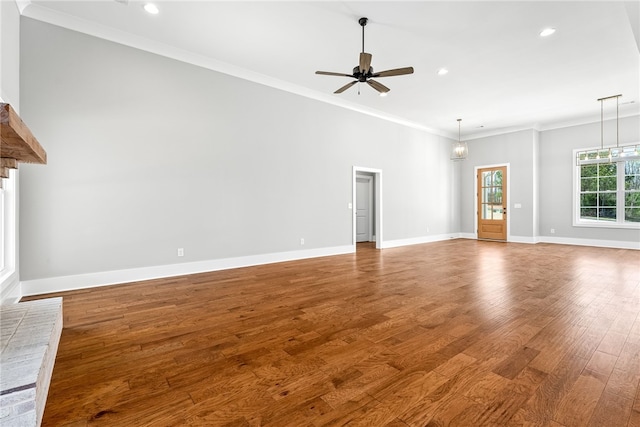 3667 Tiana Way, Opelika, AL 36801 - unfurnished living room with ceiling fan, crown molding, wood finished floors, recessed lighting, and baseboards