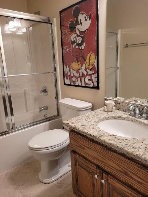 212 Melody Ln, Valley, AL 36854 - bathroom with vanity, shower / bath combination with glass door, and tile patterned flooring