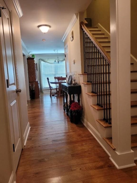 212 Melody Ln, Valley, AL 36854 - corridor with stairs, wood finished floors, and crown molding