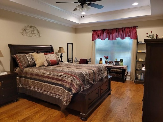 212 Melody Ln, Valley, AL 36854 - bedroom featuring a raised ceiling, wood finished floors, crown molding, recessed lighting, and a ceiling fan