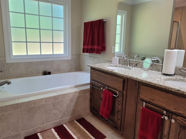 212 Melody Ln, Valley, AL 36854 - bathroom with a garden tub, double vanity, and tile patterned floors