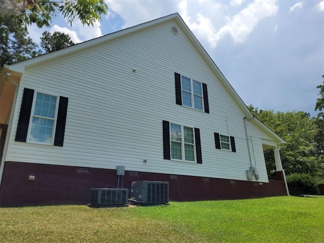 212 Melody Ln, Valley, AL 36854 - view of property exterior with crawl space and a yard
