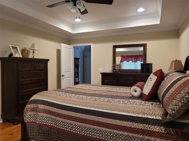 212 Melody Ln, Valley, AL 36854 - bedroom featuring wood finished floors, a raised ceiling, ornamental molding, a ceiling fan, and recessed lighting