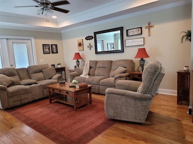 212 Melody Ln, Valley, AL 36854 - living room featuring a ceiling fan, light wood-style flooring, ornamental molding, recessed lighting, and a raised ceiling