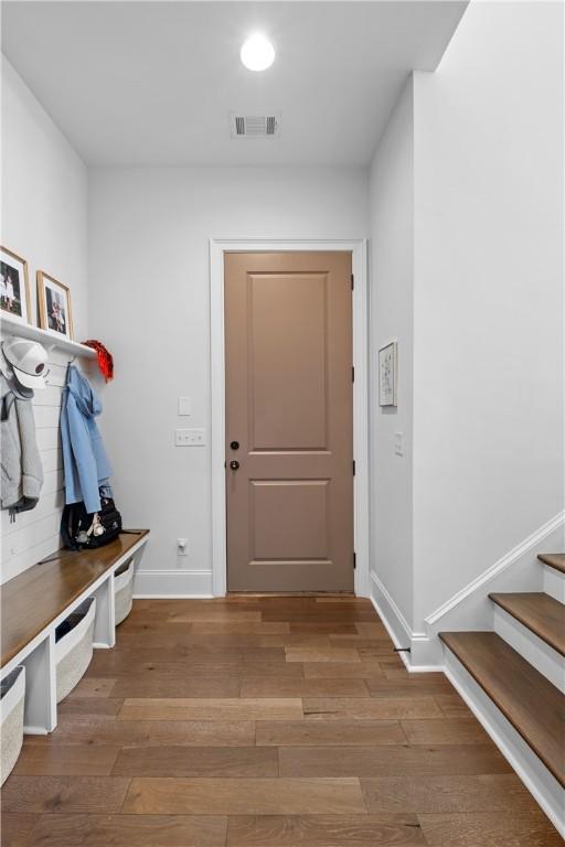 1321 Falls Crest Dr, Auburn, AL 36830 - mudroom with wood finished floors, baseboards, and visible vents