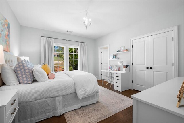 1321 Falls Crest Dr, Auburn, AL 36830 - bedroom featuring a closet, a chandelier, and visible vents