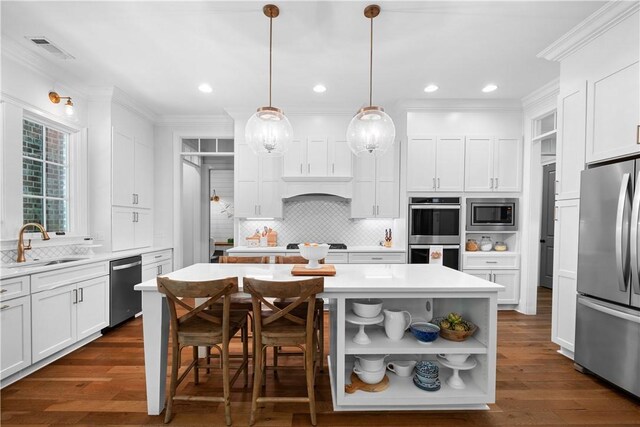 1321 Falls Crest Dr, Auburn, AL 36830 - kitchen featuring white cabinetry, open shelves, a center island, a sink, and stainless steel appliances