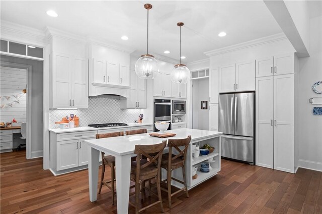 1321 Falls Crest Dr, Auburn, AL 36830 - kitchen featuring a center island, light countertops, white cabinetry, and stainless steel appliances