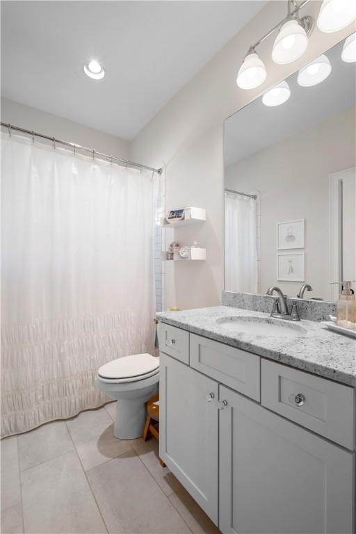 1321 Falls Crest Dr, Auburn, AL 36830 - full bath with tile patterned flooring, vanity, and toilet
