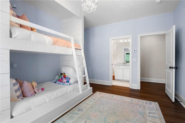 1321 Falls Crest Dr, Auburn, AL 36830 - bedroom featuring ensuite bath, a notable chandelier, baseboards, and wood finished floors