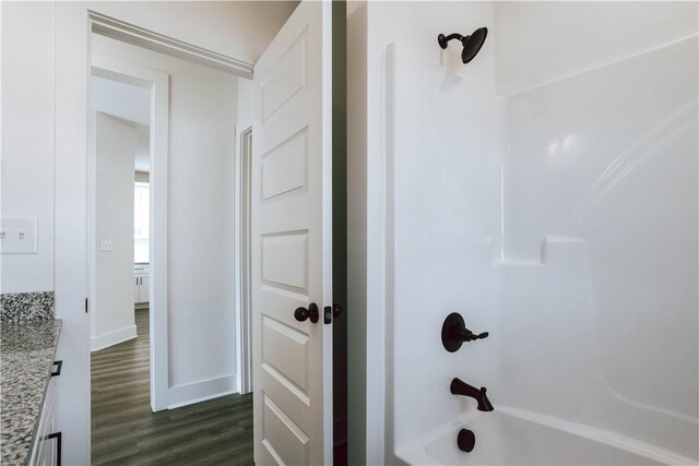 13 Crossing Ct E, Valley, AL 36854 - bathroom with bathtub / shower combination, wood finished floors, and vanity