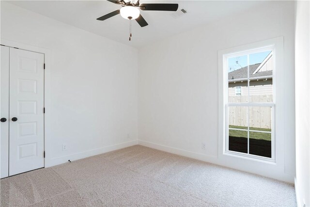 13 Crossing Ct E, Valley, AL 36854 - carpeted spare room featuring a ceiling fan and baseboards