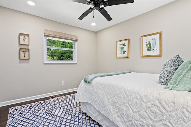 573 Hudson Ter, Auburn, AL 36830 - bedroom featuring dark wood-type flooring, baseboards, recessed lighting, and a ceiling fan