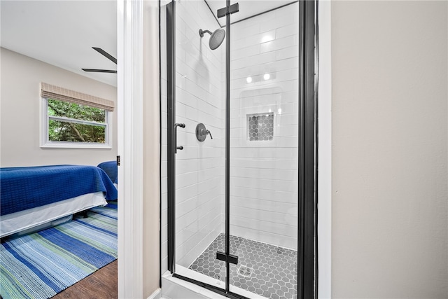 573 Hudson Ter, Auburn, AL 36830 - ensuite bathroom featuring a shower stall, wood finished floors, and ceiling fan