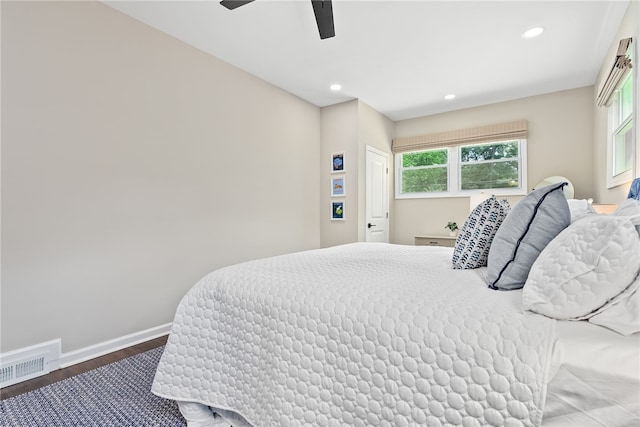 573 Hudson Ter, Auburn, AL 36830 - bedroom featuring wood finished floors, recessed lighting, baseboards, and a ceiling fan