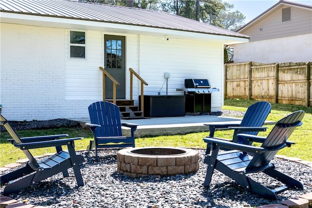 573 Hudson Ter, Auburn, AL 36830 - view of patio with a fire pit, entry steps, and grilling area