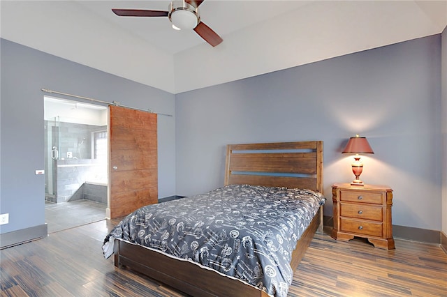 bedroom with connected bathroom, baseboards, a ceiling fan, and wood finished floors