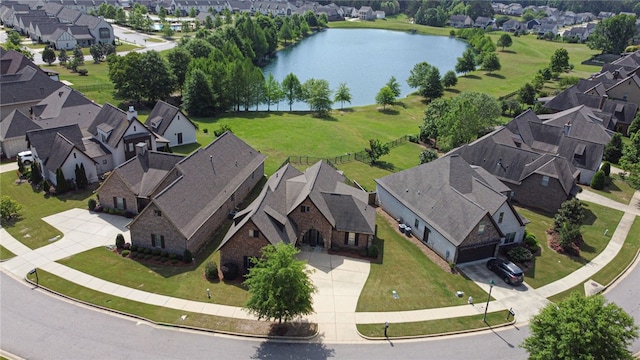 aerial view featuring a water view and a residential view