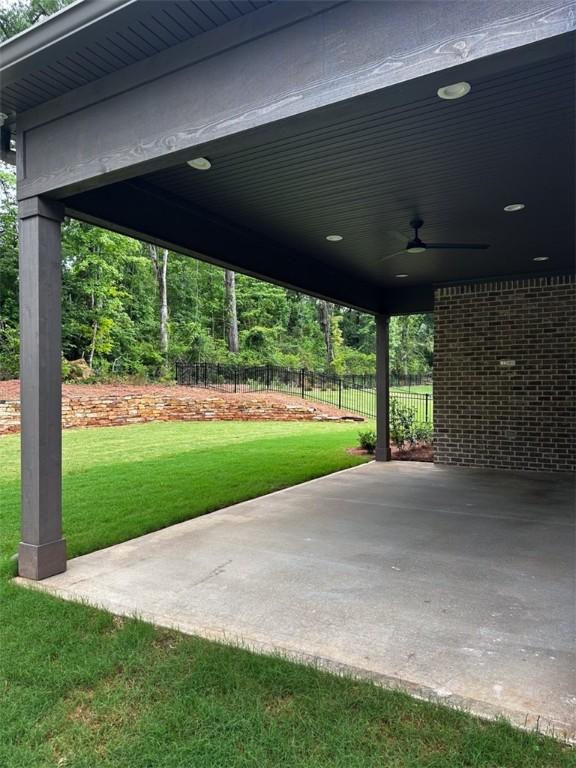 465 Windsor Dr, Opelika, AL 36801 - view of patio featuring a ceiling fan and an attached carport