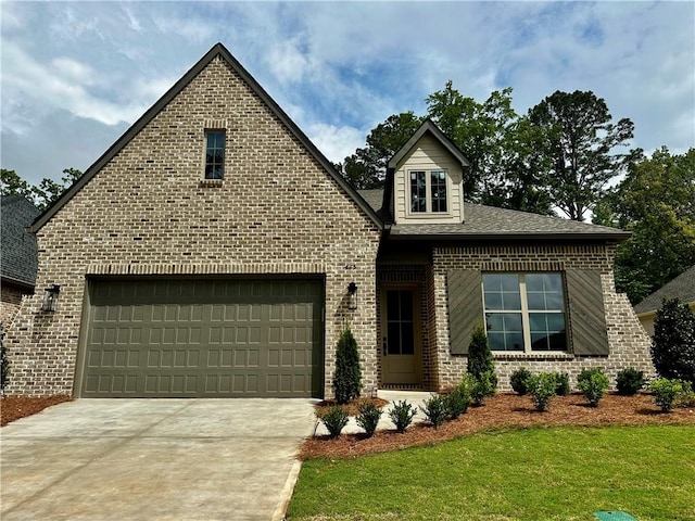 465 Windsor Dr, Opelika, AL 36801 - view of front of property with brick siding, driveway, and a front yard