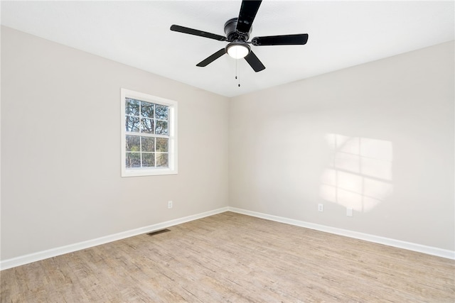 1039 Cornstalk Ln, Auburn, AL 36830 - empty room with baseboards, ceiling fan, visible vents, and light wood finished floors