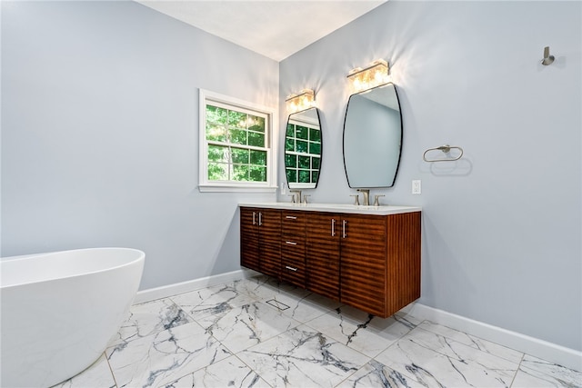 bathroom featuring vanity and a bath