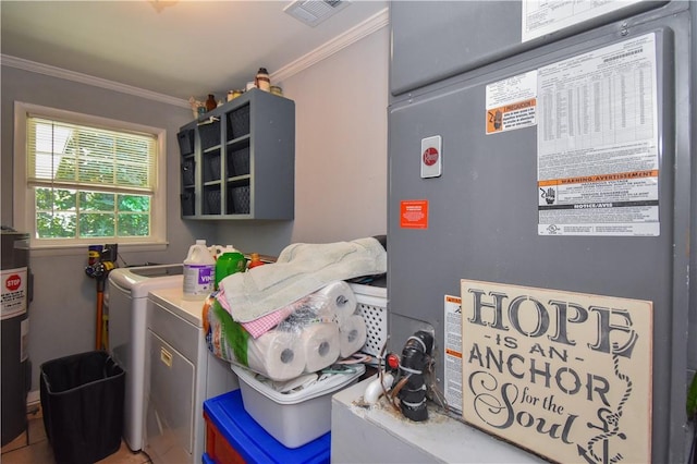 clothes washing area with electric water heater, separate washer and dryer, heating unit, and ornamental molding