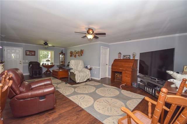 living room featuring dark hardwood / wood-style floors, ceiling fan, and ornamental molding