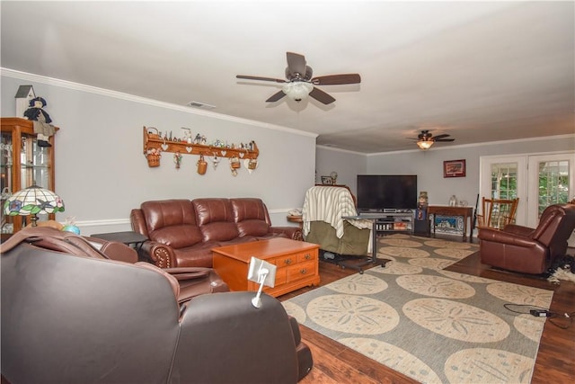 living room featuring ceiling fan, hardwood / wood-style floors, and ornamental molding