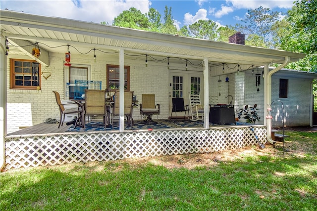 back of house with a yard